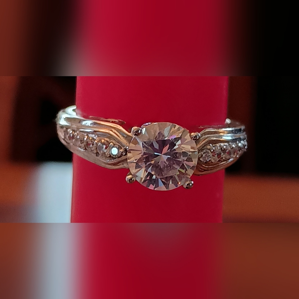 Silver Round Diamonique Solitaire Ring With Side Stones. 10